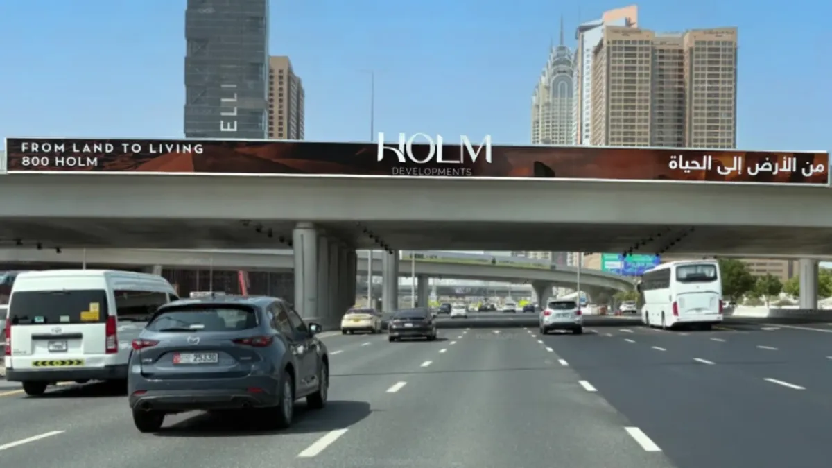 HOLM Developments Builds Brand Presence with Bridge Banners and Digital Screens in Dubai
