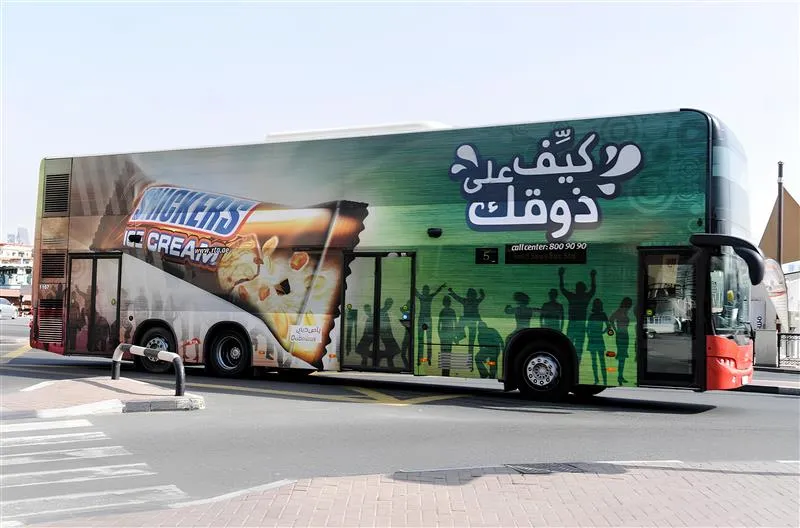 Snickers Advertises on Double-Decker Buses in Dubai - Bus Advertising