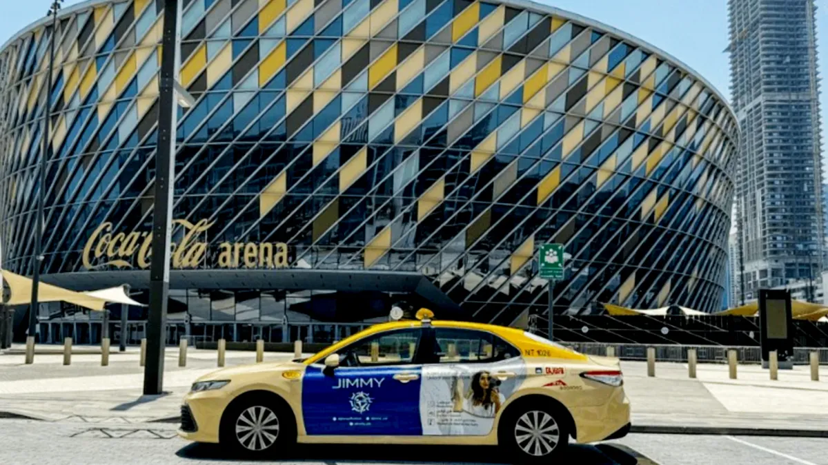 Jimmy UAE's Advertising Campaign on a Dubai Taxi near Coca Cola Arena - Dubai Taxi Advertising