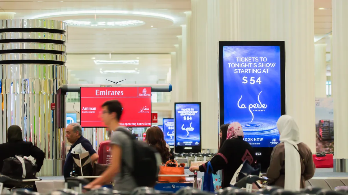 La Perle's Programmatic Digital Advert at Dubai International Airport Terminal 3 - Gulf Airport Advertising