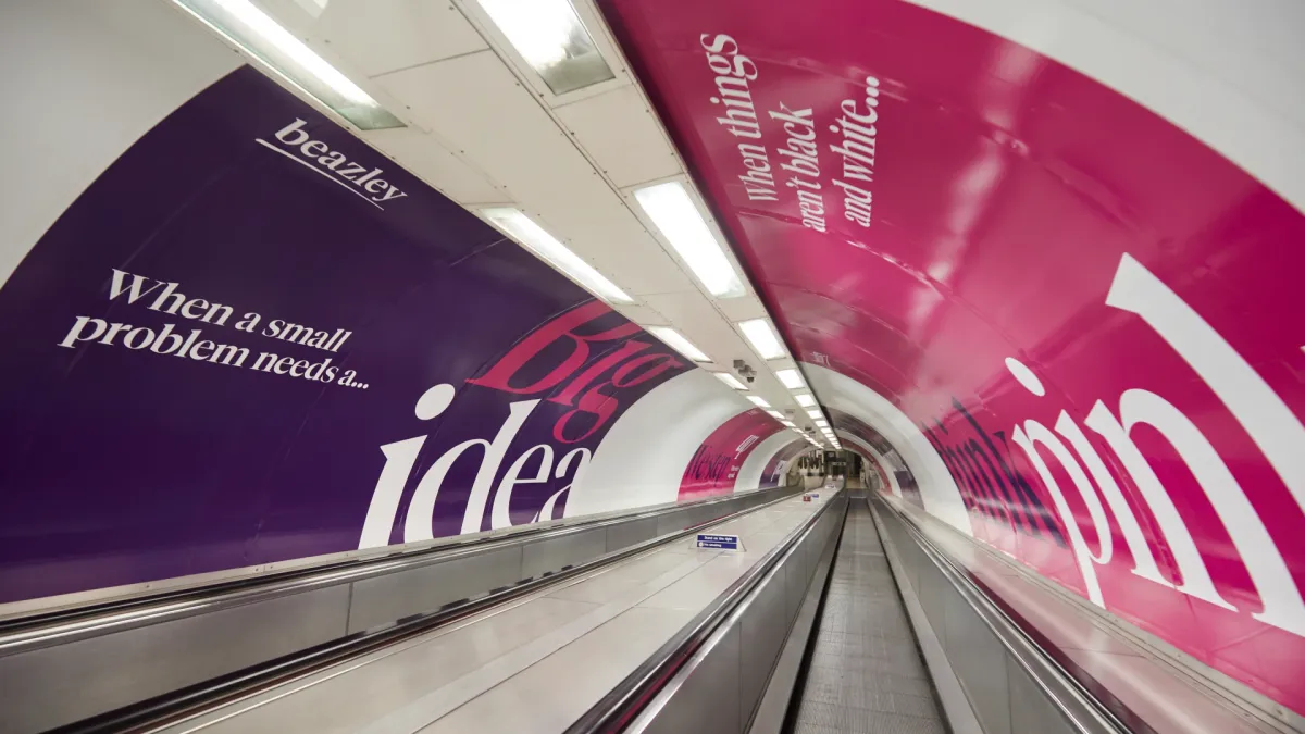 Beazley BANK TRAVELATOR Advertising at the London Tube - London Underground Advertising