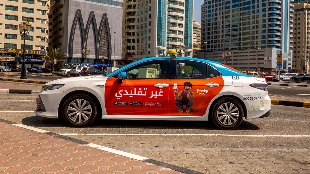 Funky Souq on a taxi in Arabic language