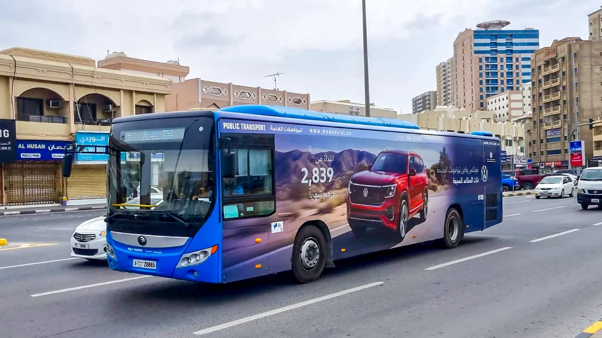 Nissan Advertises on Standard Single-Deck Bus in Dubai - Bus Advertising