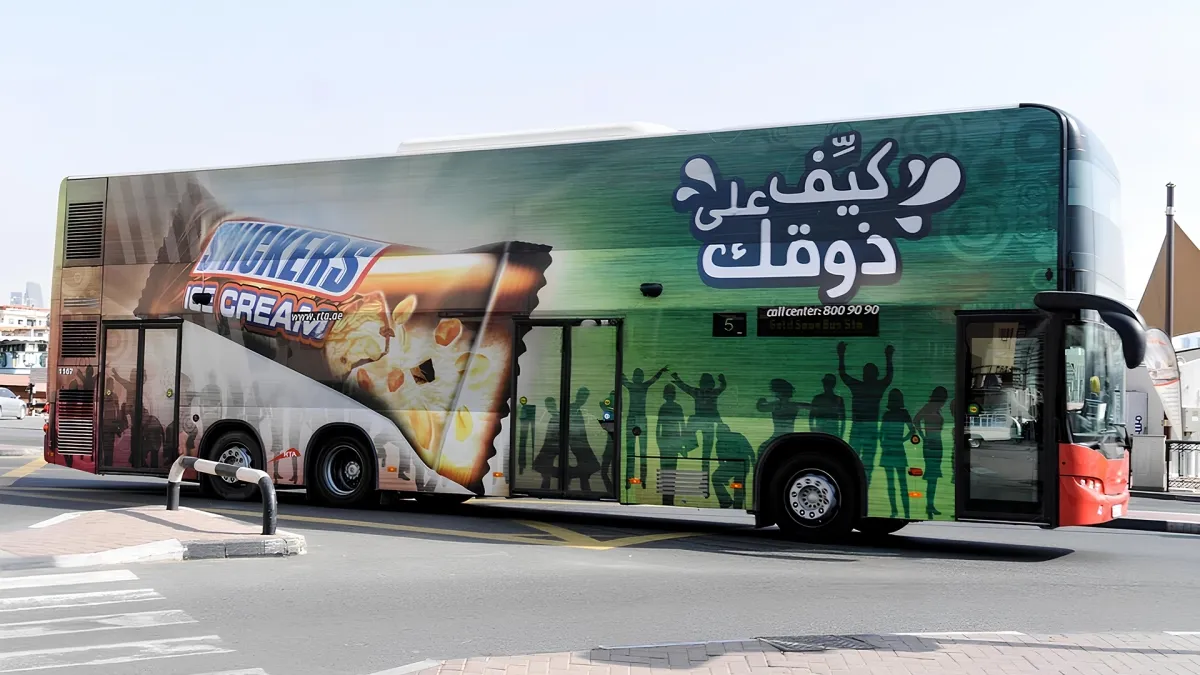 FMCG Brand Snickers Advertising on Dubai Bus